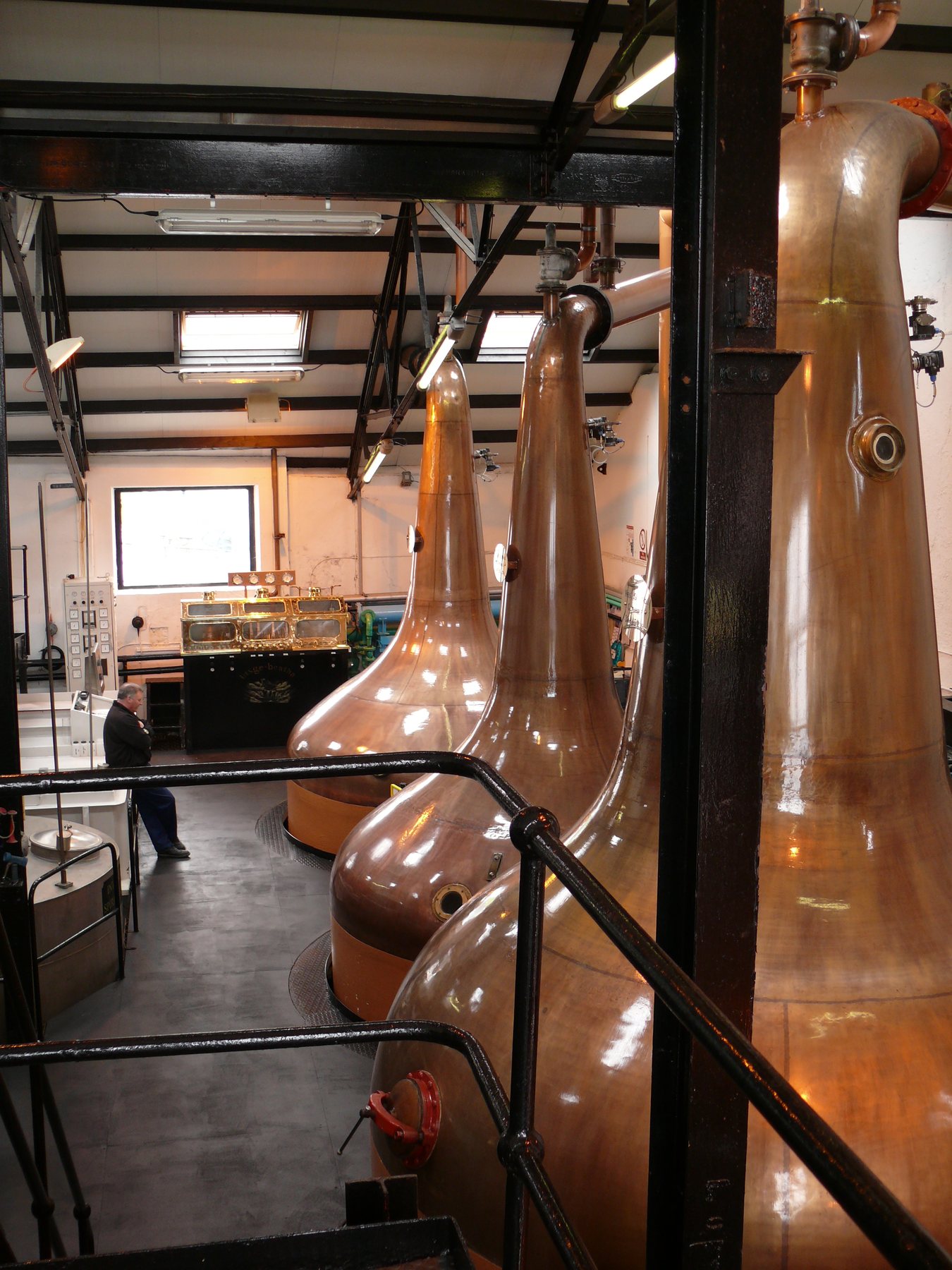 Copper stills inside Bowmore Distillery’s stillhouse