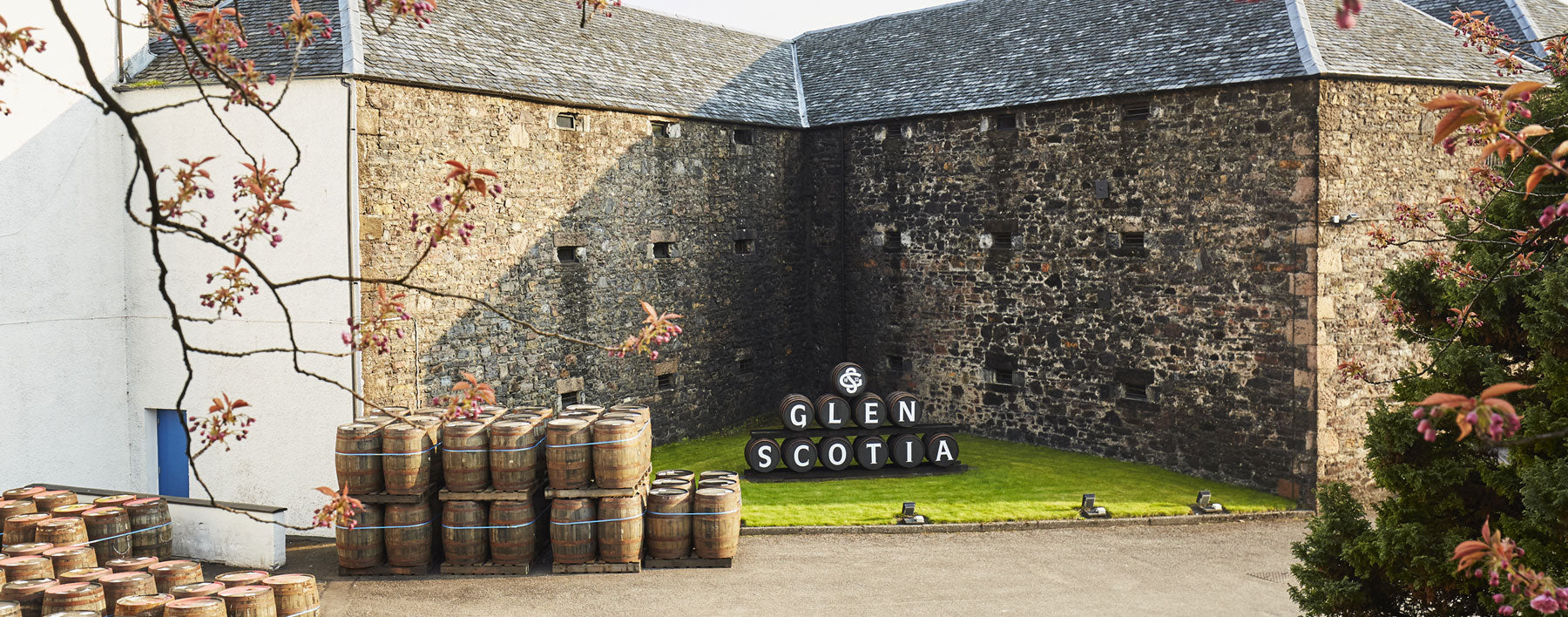Glen Scotia Distillery buildings and cask yard in Campbeltown.