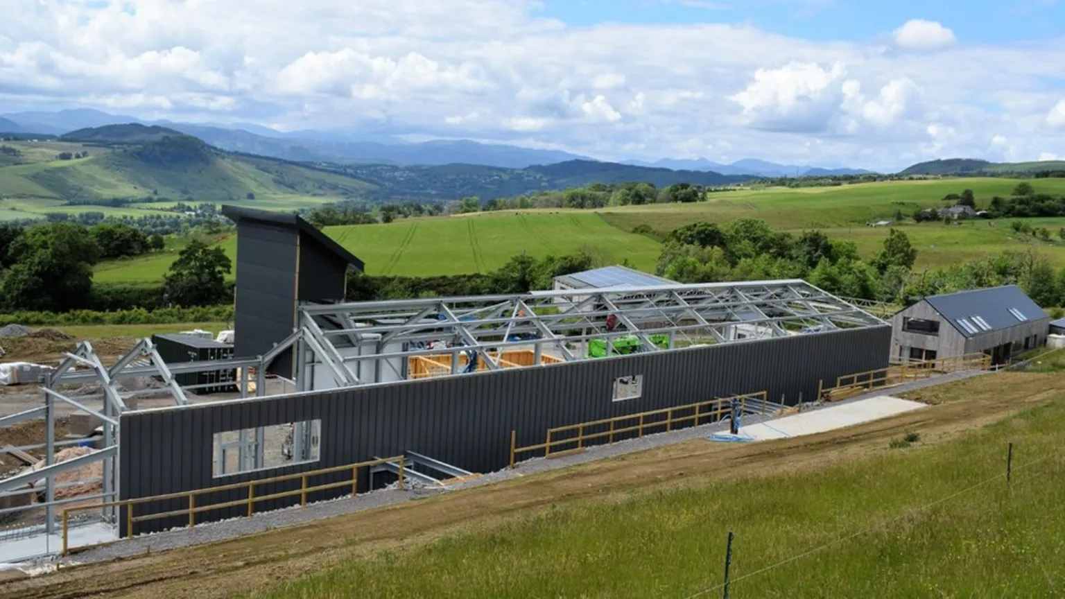 GlenWyvis Distillery under construction near Dingwall, with exterior walls being added to the steel frame.