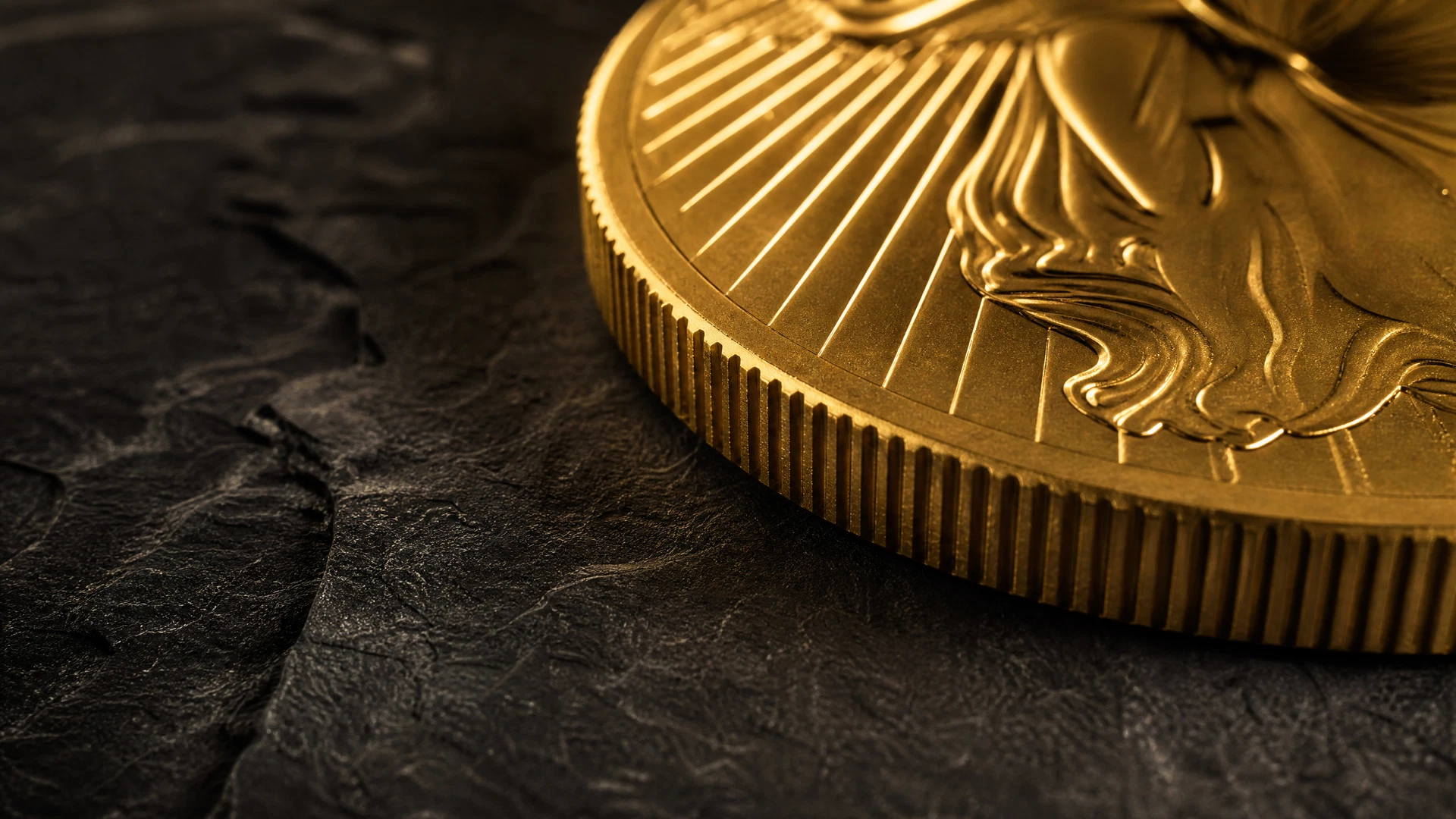 Macro view of the milled edge and abstract struck detail on an unbranded gold bullion coin