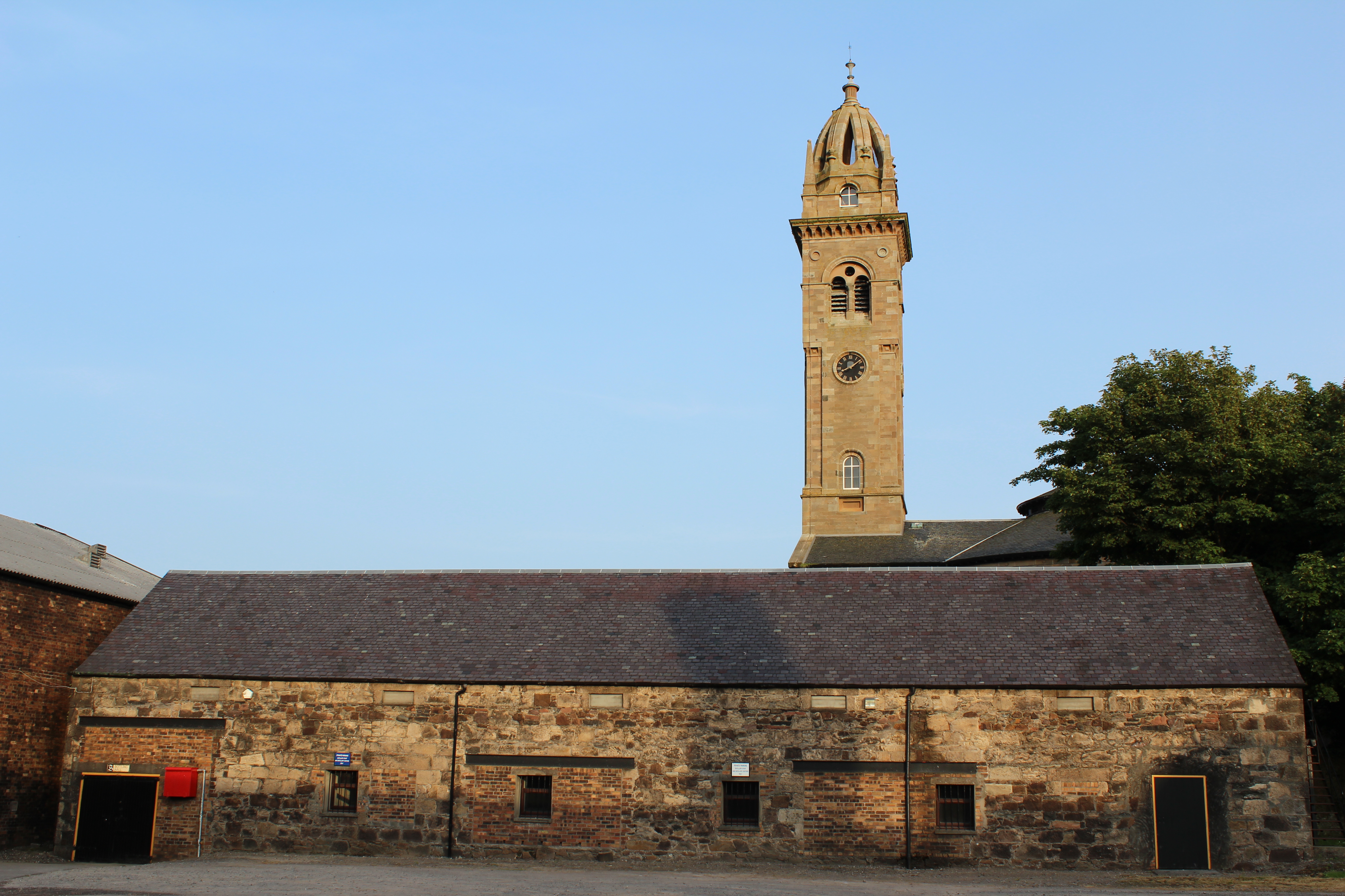 Springbank Distillery buildings in Campbeltown, viewed from the access road.